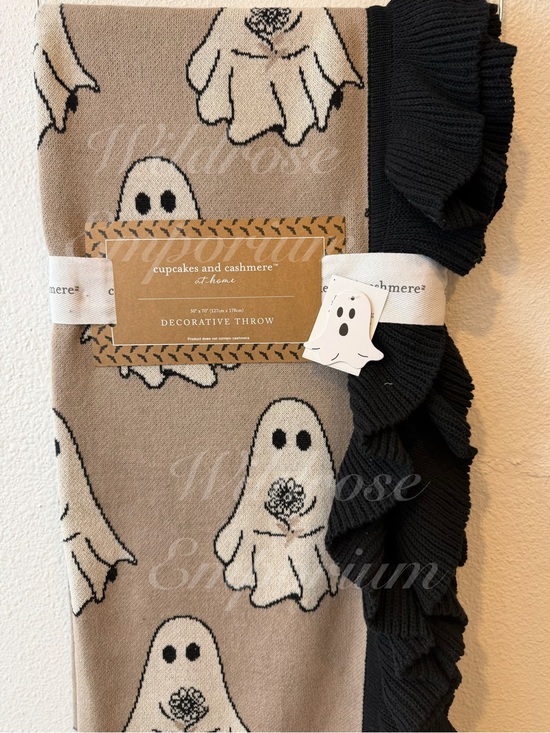 cupcakes & cashmere Other - Cupcakes and Cashmere ghost holding bouquet flowers ruffled hem knit throw viral
